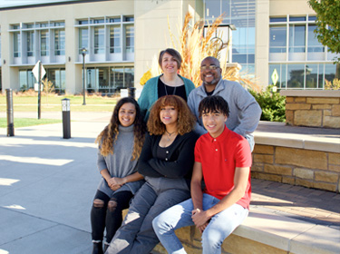 Group of employees sitting outside Kreg Tool