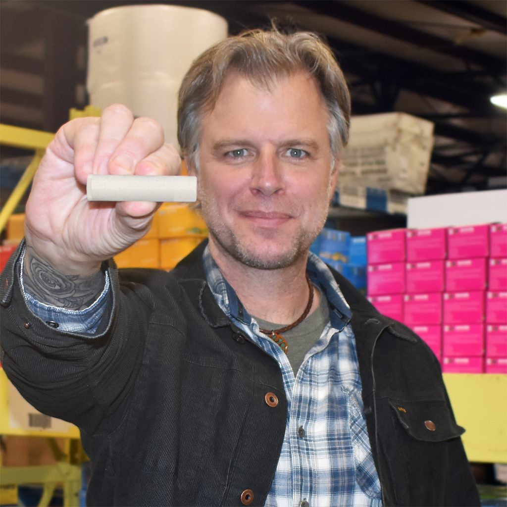 Man holding lip balm