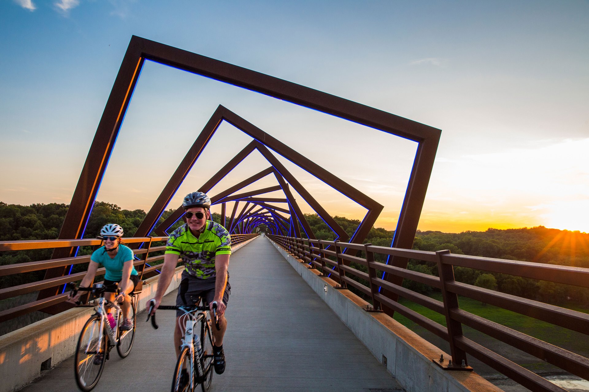 two bikers on a bridge